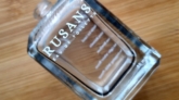 sablon merek rusans pada botol parfum kaca